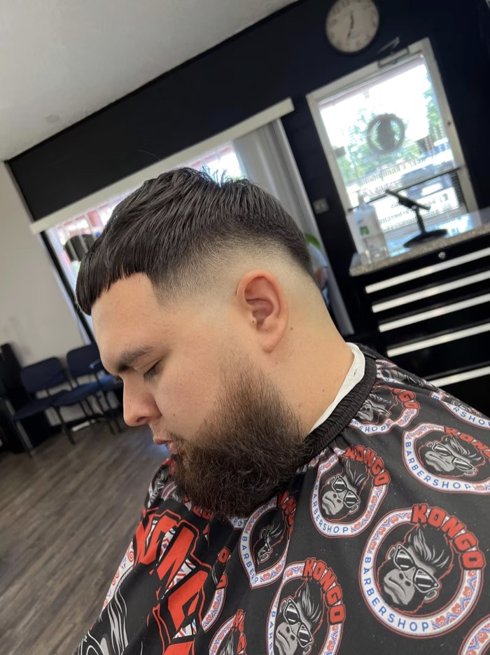 Mid fade with full beard